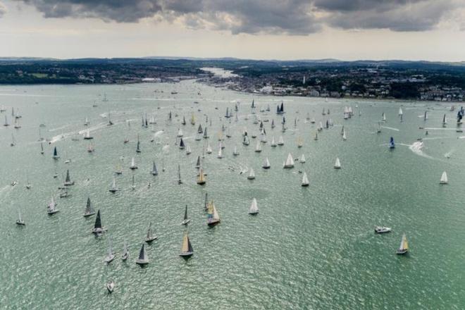 The record Rolex Fastnet Race fleet make their way out of the Solent 356 boats from 25 countries participated - 2015 Rolex Fastnet Race ©  Rolex/ Kurt Arrigo http://www.regattanews.com